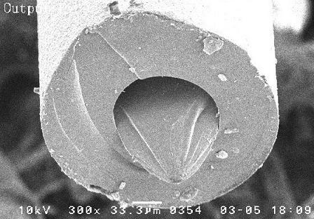 SEM- Fractured Optical Fiber with Graphitic Carbon Inclusion at Fracture Origination Site